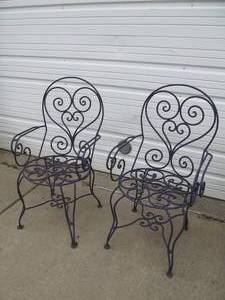 lot 234 image: Pair of Heavy Ornate Scrolled Iron Purple Patio Chairs