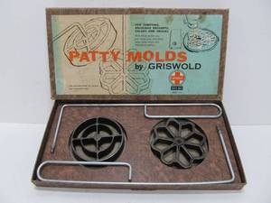 lot 116 image: Vintage GRISWOLD Cast Iron Patty Molds wBox