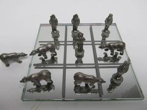 lot 304 image: Miniature Pewter Tic-Tac-Toe Set wGlass Board