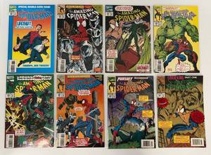 lot 11 image: Group Of Vintage Comic Books In Protective Sleeves Including  The Amazing Spider-man Special Double Sized Issue LifeTheft The Final Chapter And More