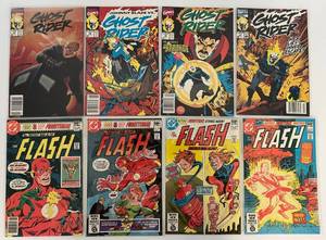 lot 61 image: Group Of Vintage Comic Books In Protective Sleeves Including The Flash 50 Cent And More