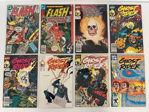 lot 63 image: Group Of Vintage Comic Books In Protective Sleeves Including The Flash 35 Cent And Ghost Rider