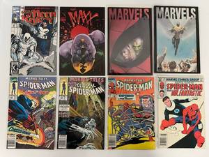 lot 90 image: Group Of Vintage Comic Books In Protective Sleeves Including 60 Cent Spider-man And More