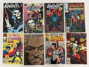 lot 102 image: Group Of Vintage The Punisher Comic Books In Protective Sleeves