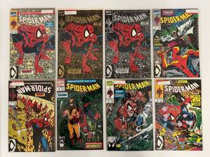 lot 123 image: Group Of Vintage Spiderman Comic Books In Protective Sleeves