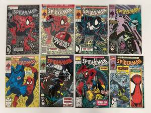 lot 124 image: Group Of Vintage Spiderman Comic Books In Protective Sleeves