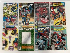 lot 126 image: Group Of Vintage Spiderman Comic Books In Protective Sleeves