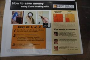 lot 9 image: Heat Surge Fireless Flame Roll and Glow Electric Heater