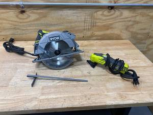 lot 48 image: RYOBI 15 Amp Corded 7-14 in. Circular Saw and RYOBI 0.4 Amp Corded 2-78 in. Detail Sander