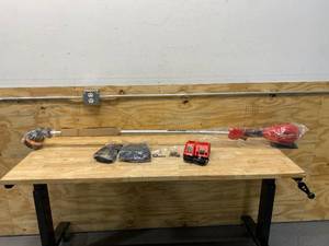 lot 100 image: MILWAUKEE 18V M18 String Trimmer (with charger)