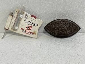 lot 14 image: Sad Iron and Metal Rain Gauge