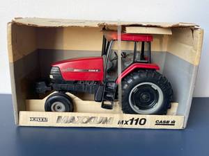 lot 27 image: ERTL Case IH MX110 Die Cast Model