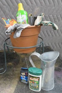 METAL PLANT STAND WITH GARDENING GOODIES