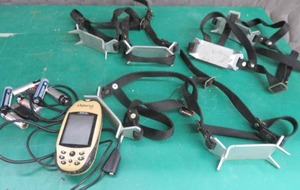 MAGELLAN EXPLORIST 210 & 2 PAIRS OF STRAP ON ICE TRACTION CLEATS