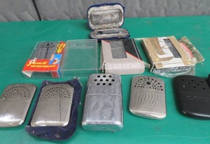 6 VINTAGE HANDWARMERS & 2 PACTS FLUID STICKS & CASE