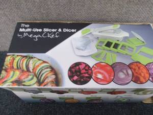 lot 22 image: MegaChef 8-in-1 Multi-Use Slicer Di...