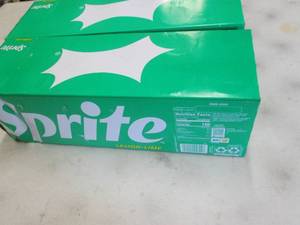 lot 74 image: 2- 12 pks 12 oz Cans Sprite...