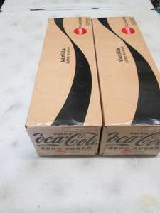 lot 77 image: 2- 12 pks 12 oz  Cans Vanilla Coke ...