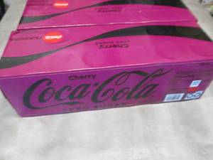 lot 93 image: 2- 12 pks 12 oz Cans Cherry CocaCol...
