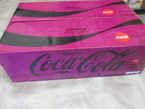 lot 94 image: 2- 12 pks 12 oz Cans Cherry CocaCol...