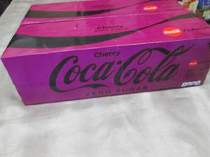 lot 97 image: 2- 12 pks 12 oz Cans Cherry CocaCol...