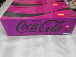lot 98 image: 2- 12 pks 12 oz Cans Cherry CocaCol...