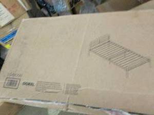 black metal day bed looked unopened...