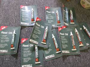 10 packages of mitchell reel oil .4...