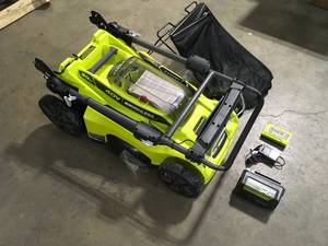 lot 4 image: RYOBI 40V Brushless 20 in. Cordless Battery Walk Behind Push Lawn Mower with 6.0 Ah Battery and Charger customer Returns See Terms on Auction