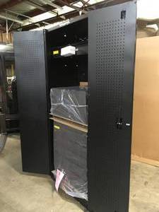 lot 21 image: Husky 3-Piece Heavy Duty Welded Steel Garage Storage System in Black (64 in. W x 81 in. H x 24 in. D) dented Customer Returns See Terms on Auction