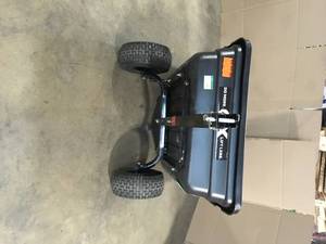 lot 31 image: PRO-Grade Stockman 15 cu ft. - 17 cu ft. Lift-Assist and Swivel Dump Cart w 4PLY Run-Flat Tires By OXCART Customer Returns See Terms on Auction