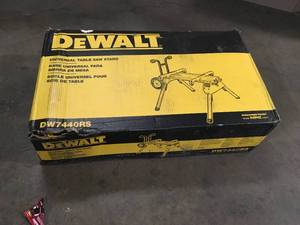lot 37 image: DEWALT 33 lbs. Heavy Duty Rolling Table Saw Stand with Quick-Connect Stand Brackets with 200lbs. Capacity Customer Returns See Terms on Auction