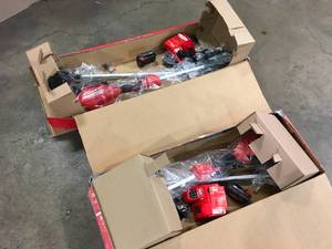 lot 41 image: ot of 2 Milwaukee M18 FUEL 18V Lithium-Ion Brushless Cordless String Trimmer with QUIK-LOK Attachment Capability with charger aned battery Customer Returns See Terms on Auction