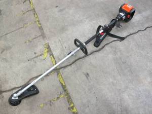 lot 458 image: YARD FORCE YOLTX18TB00 120V Li-Ion 18 Line Trimmer with Push-Button Speed Control, NO BATTERYCHARGER