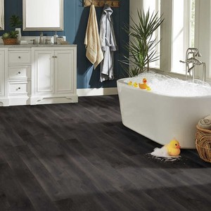 lot 422 image: Roughly 270 Sq Ft (16 Boxes) of Mohawk Home Bold Black Oak Waterproof Laminate 12mm Thick Plank With 2mm Attached Pad Included