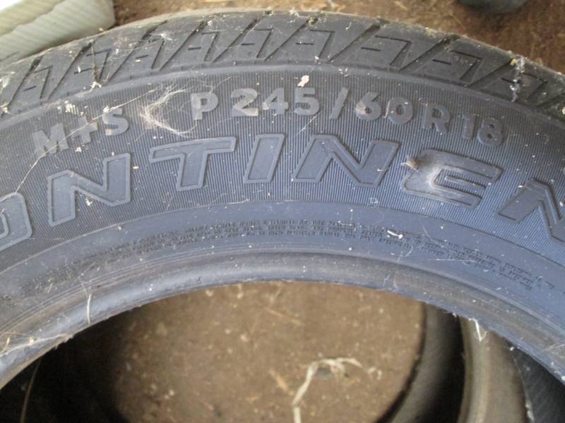 2 Continental 24560R18 tires (see ...
