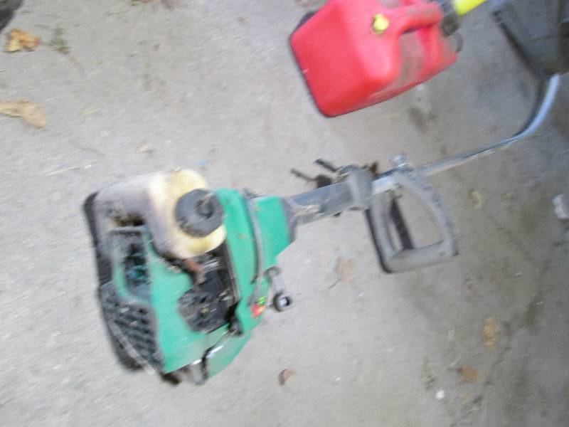 Featherlite weed eater and 1gal gas...
