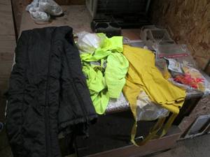 Rain pants safety vests and snow pa...