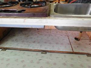 lot 103 image: Portable Propane stove and sink built in a cabinet