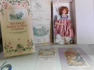 lot 23 image: The great american doll company porcelain doll with cloth body limited edition - Marlene