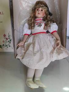 lot 24 image: The great american doll company porcelain doll with cloth body limited edition - Bernadette