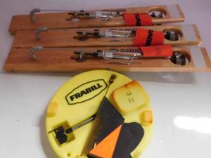 lot 39 image: 3 wooden tip ups and 1 plastic round tip up