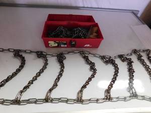 lot 40 image: pair of tire chains with plano box