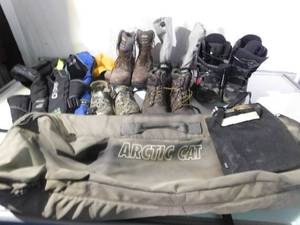 lot 84 image: Boots, crocs, Artic cat bag, and float harnesses