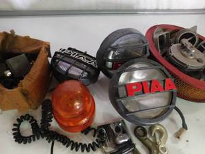 lot 91 image: 2 totes of Quad or truck spot lights wire, auto parts and more