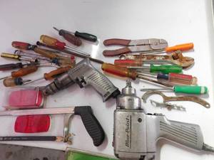 lot 92 image: Tote of tools (saws, screw drivers impact wrenches and more)