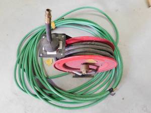 lot 97 image: Reel up air hose and extra air hose