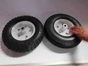 lot 106 image: 2 wheel barrow tires