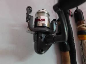 lot 152 image: 3 ice fishing rod and reel combos and 1 ice stick