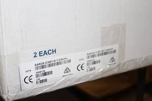 lot 24 image: New in Box - PAIR of Crestron SAROS ICS8T-B-T Black 8 In-Ceiling Sub Woofer Subwoofer Bass Speakers